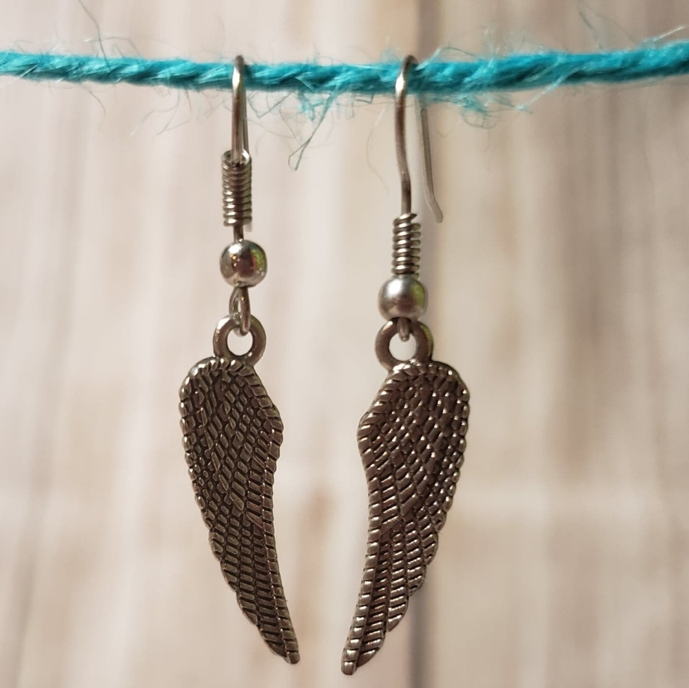 ✔️Rustic silver wing earrings